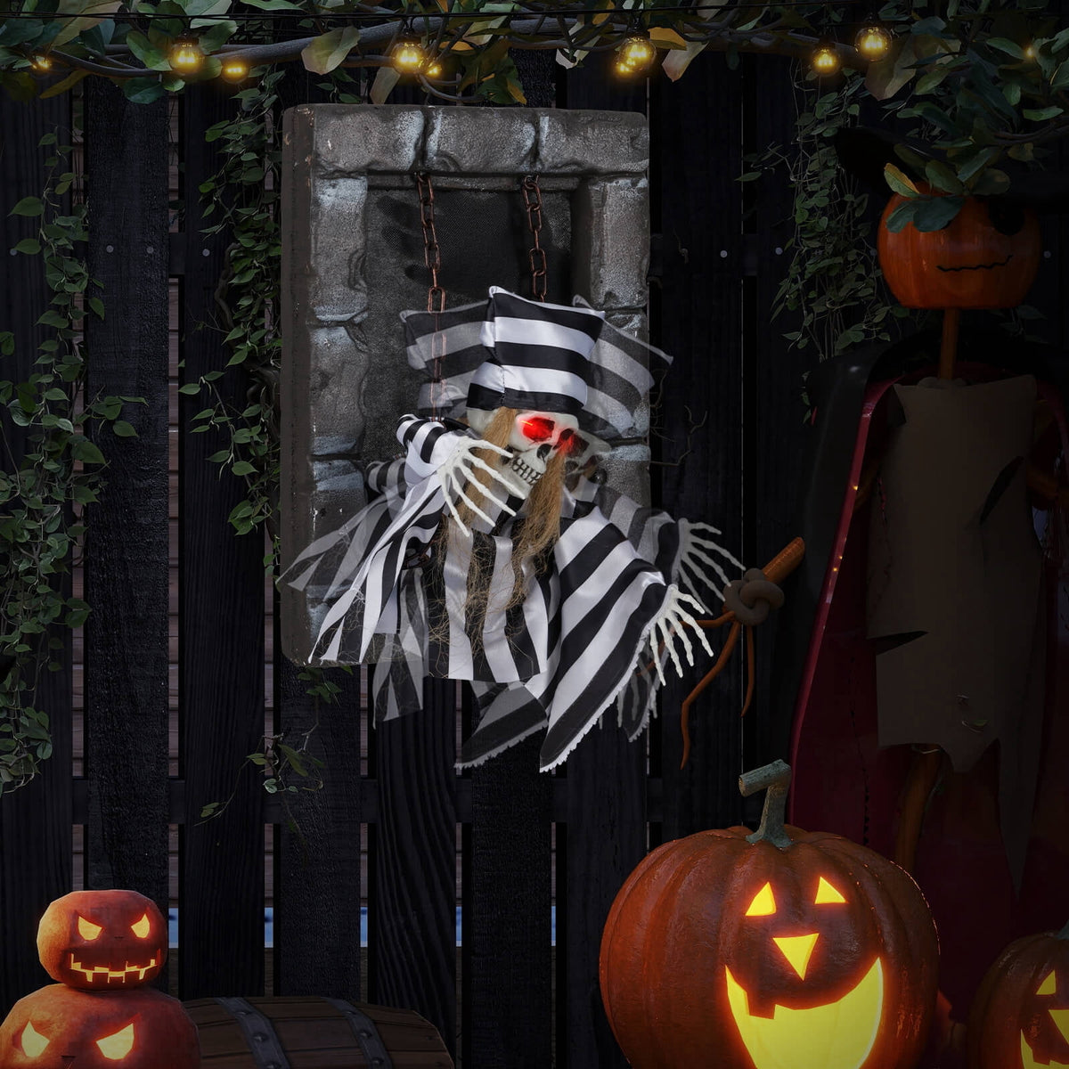 Costway Animated Halloween Decoration 18” Hanging Skull Prisoner with Light-up Eyes